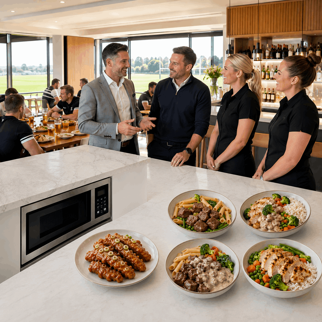 Club managers with catering staff beside a Nova Chef smart oven and chef-made power bowls